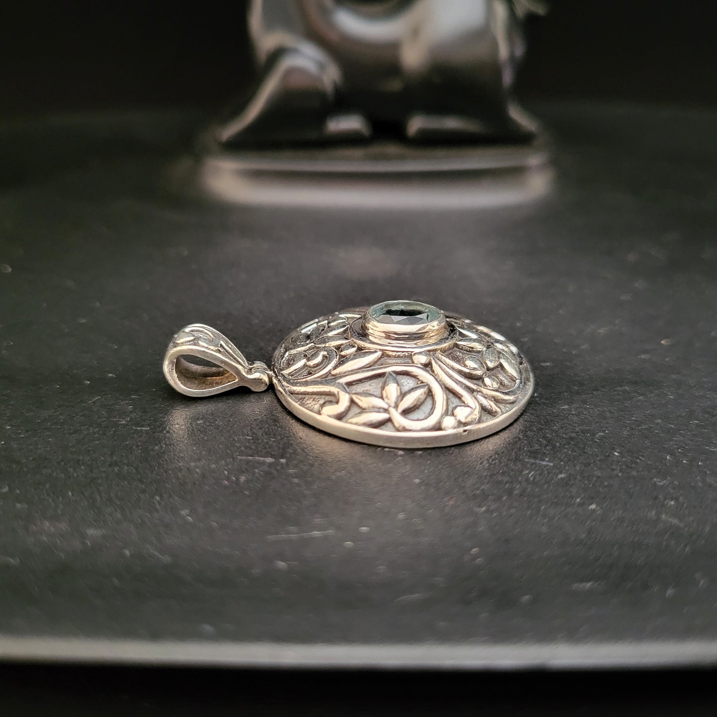 "Regal Guardian" Silver Pendant with Blue Topaz