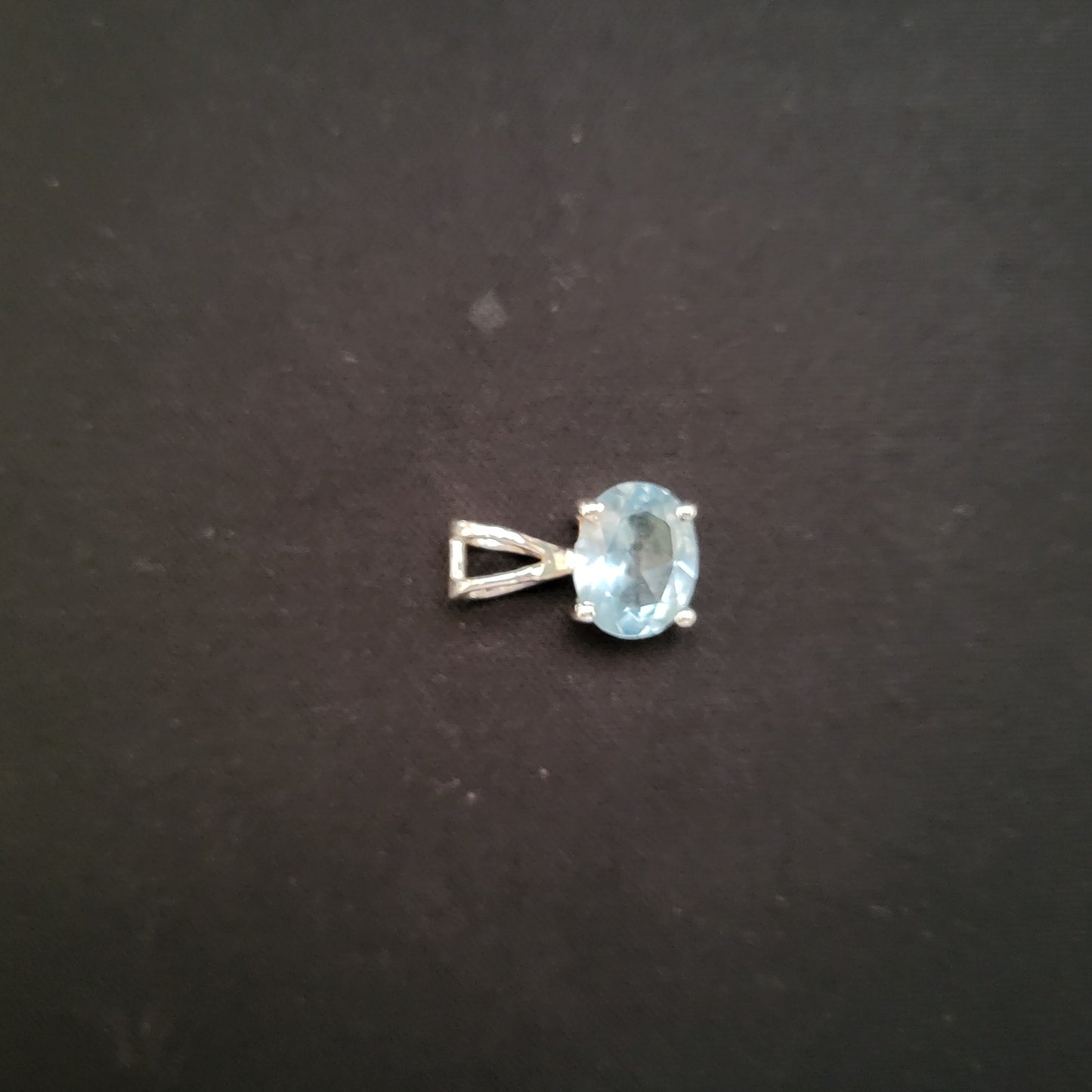 "Sparkling Sky" Silver Pendant with Blue Topaz