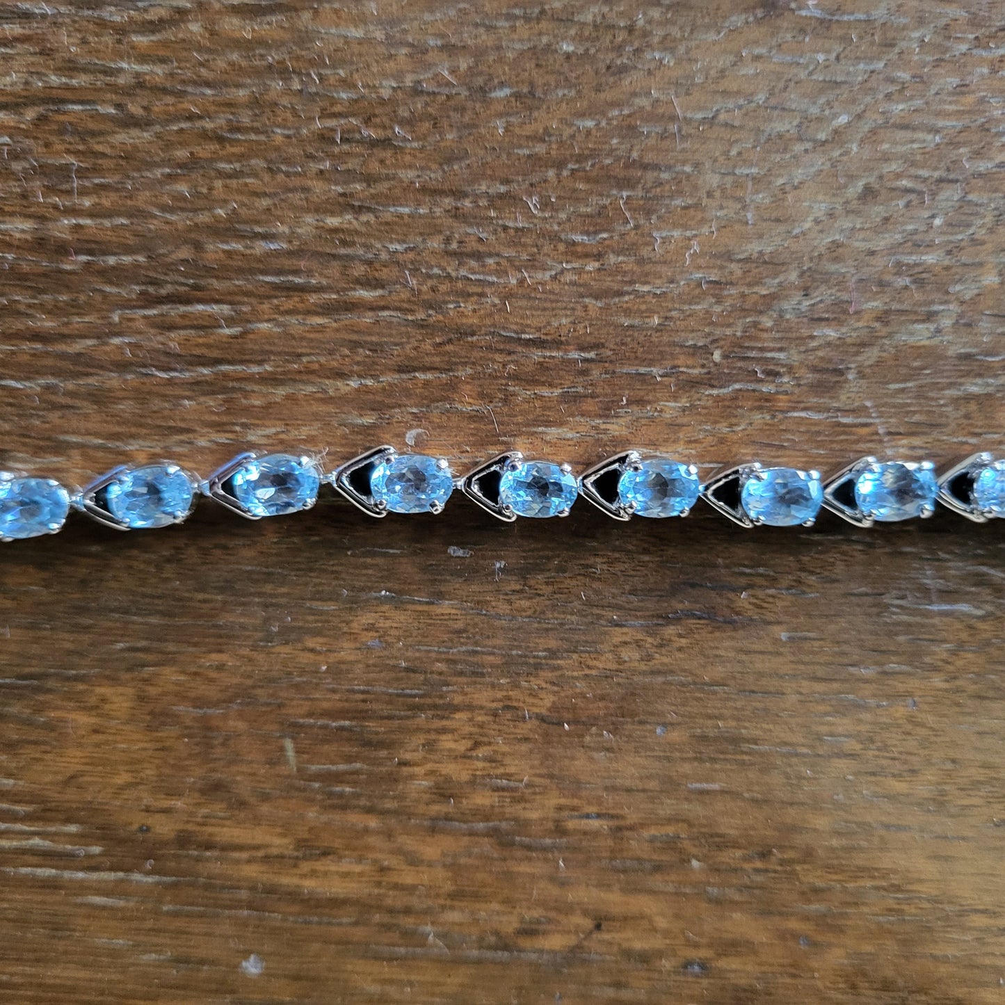 "Azure Clasp" Silver Bracelet with Blue Topaz