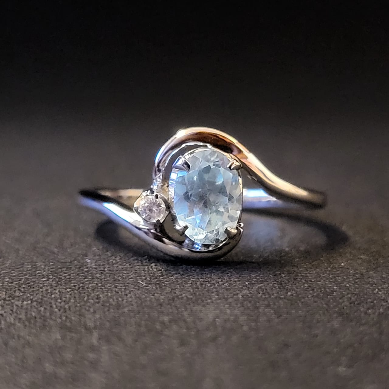 "Guarded Droplet" Silver Ring with Blue Topaz