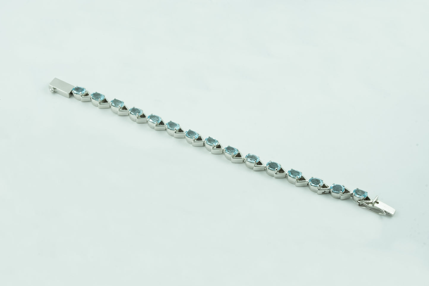 "Azure Clasp" Silver Bracelet with Blue Topaz