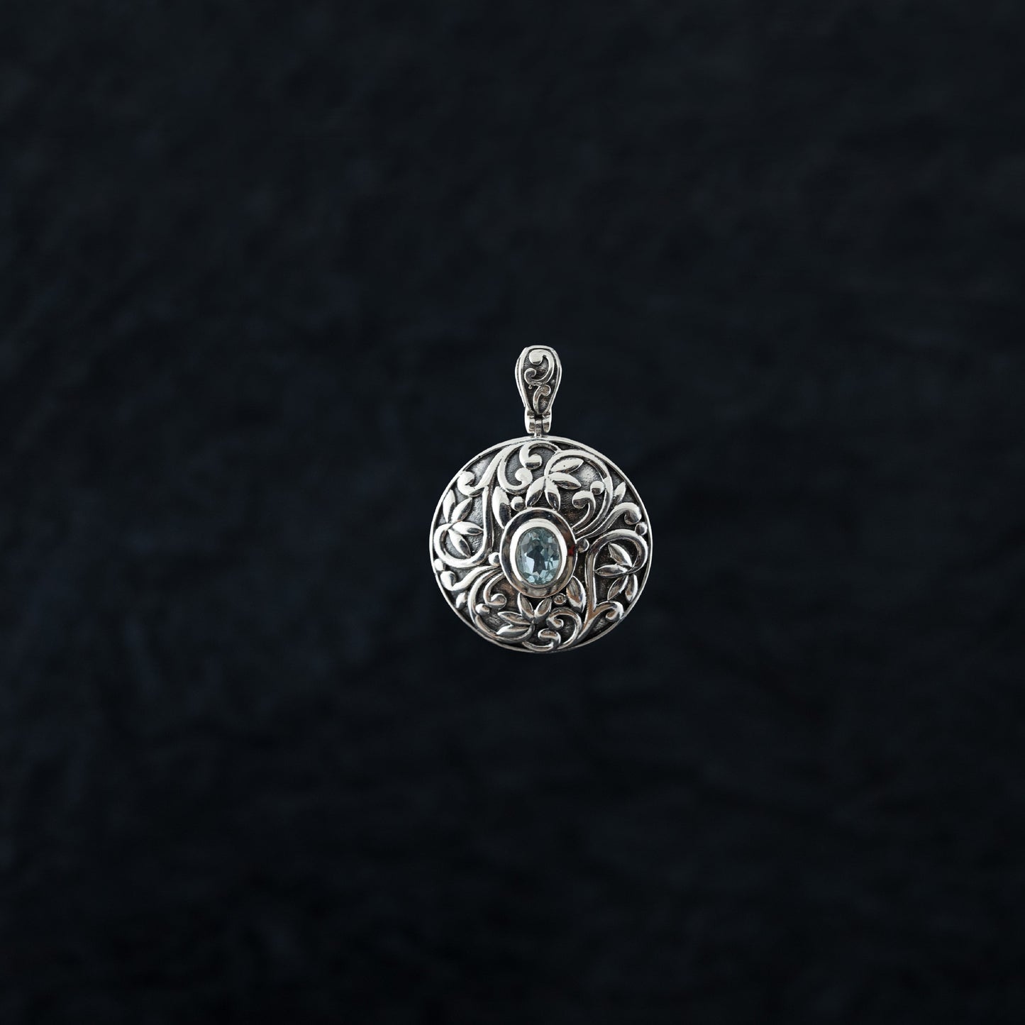 "Regal Guardian" Silver Pendant with Blue Topaz