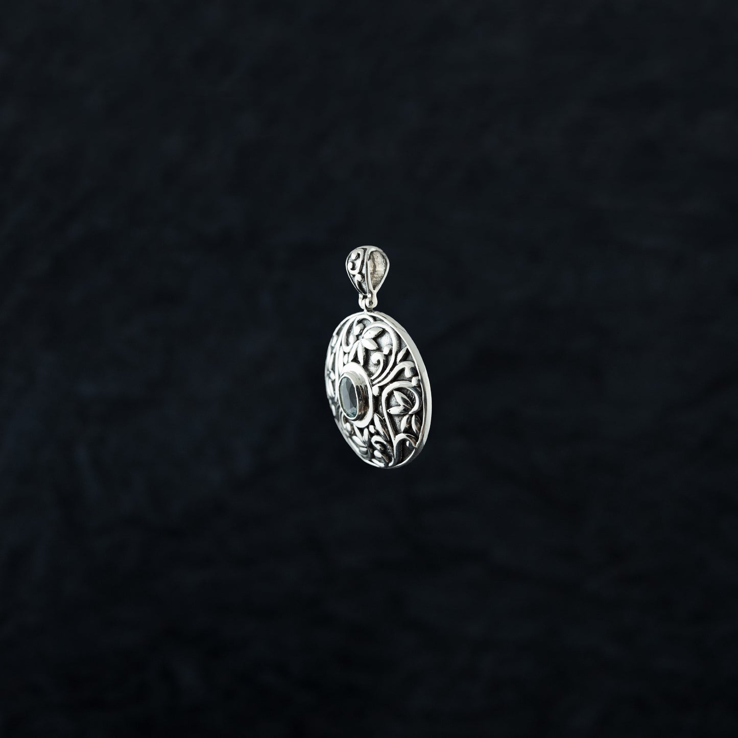 "Regal Guardian" Silver Pendant with Blue Topaz