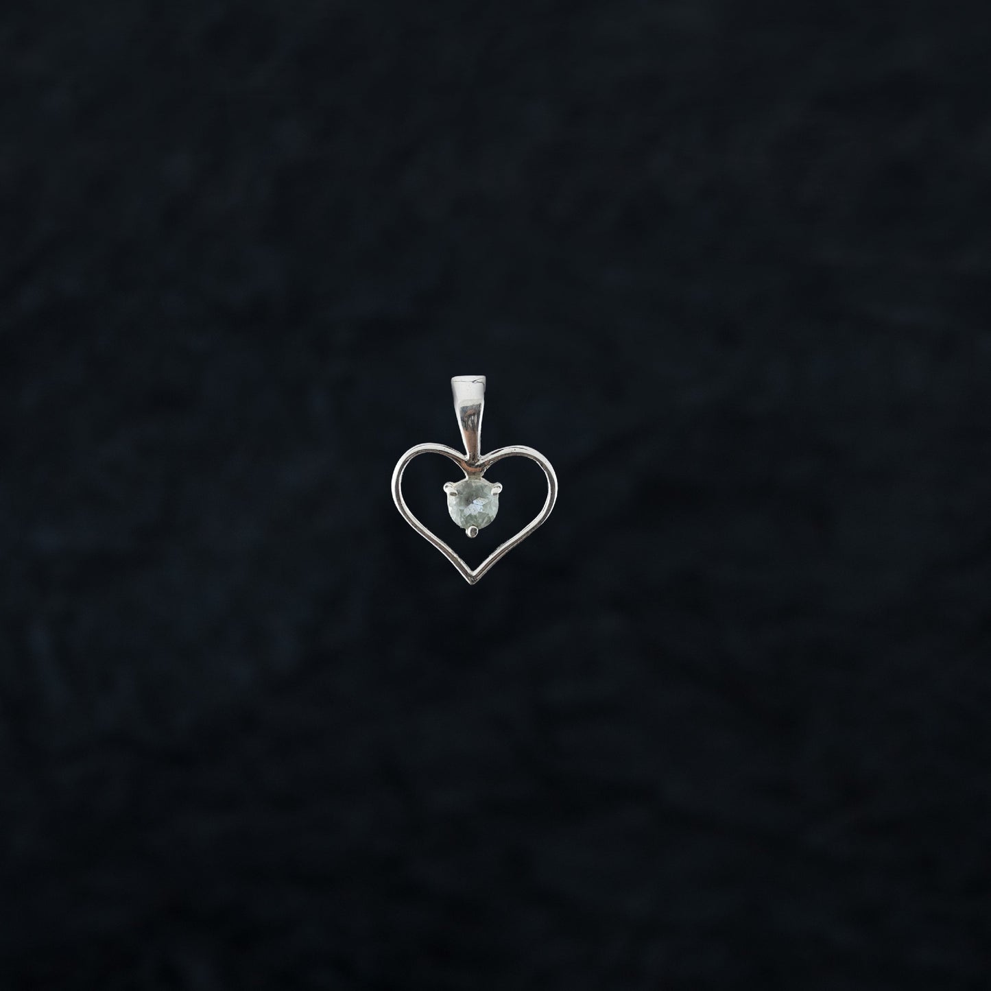 "Heart Center" Silver Pendant with Blue Topaz
