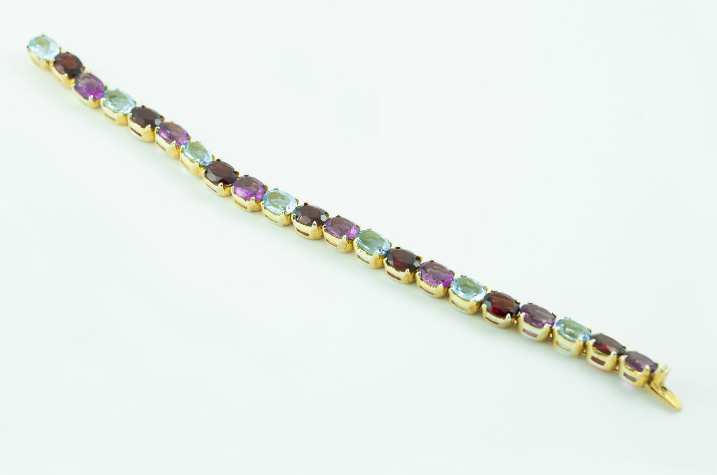 "Precious Symphony" Silver Bracelet with Amethyst, Garnet, and Blue Topaz