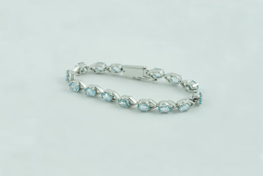 "Azure Clasp" Silver Bracelet with Blue Topaz