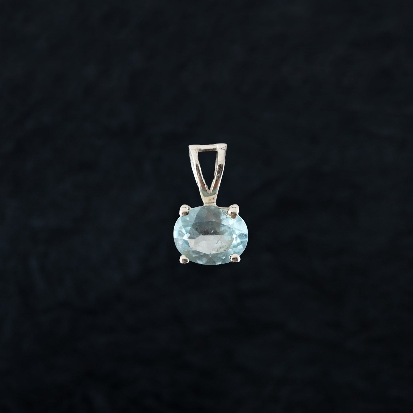 "Sparkling Sky" Silver Pendant with  Blue Topaz