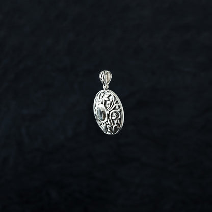 "Regal Guardian" Silver Pendant with  Blue Topaz